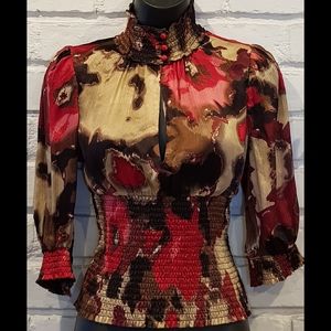 colorful silk Bebe peekaboo top